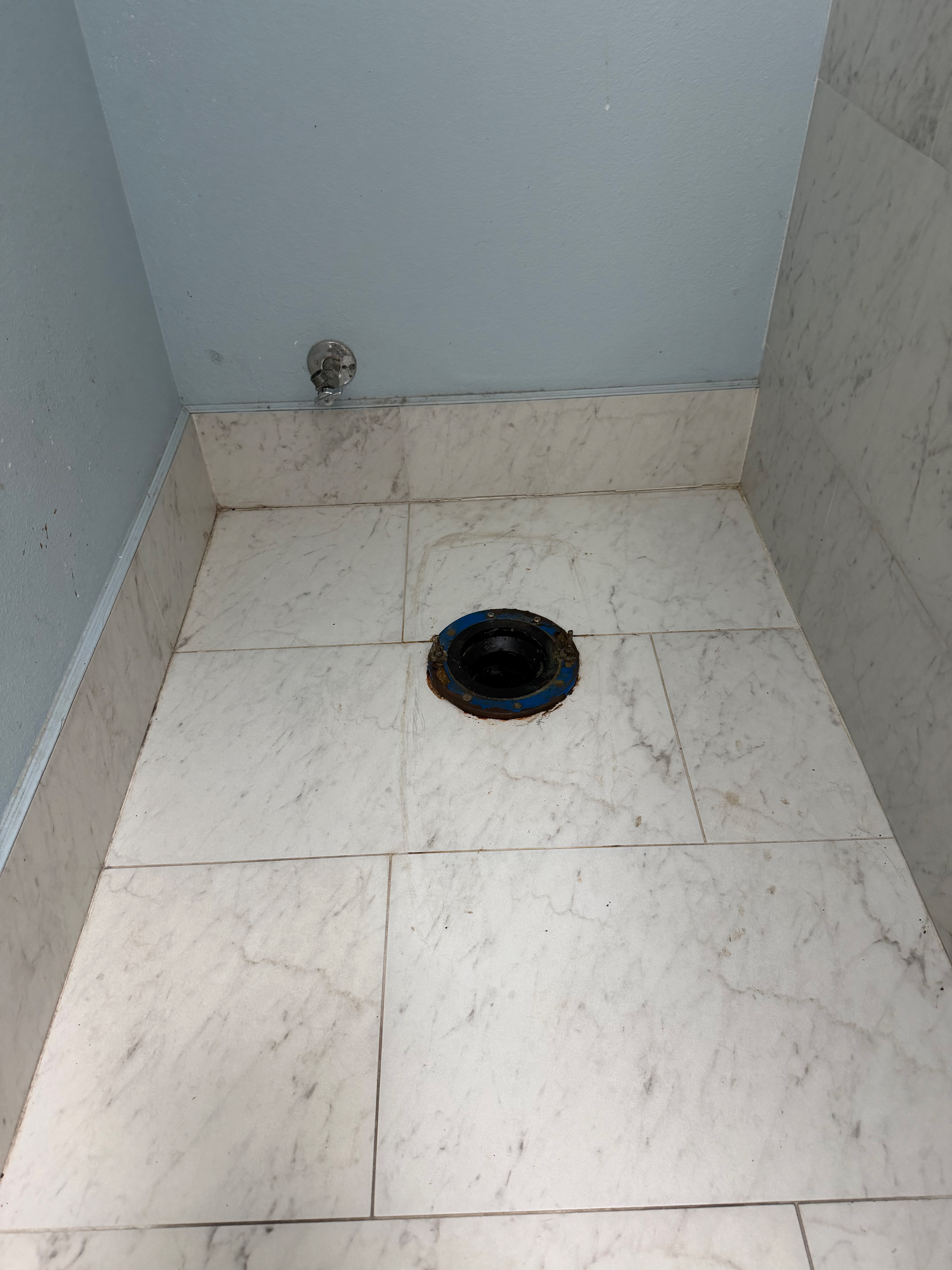 Area cleaned and prepped after old toilet removed